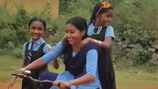 <div class="paragraphs"><p>Video grab of&nbsp;Salini teacher riding a cycle wearing school uniform.</p></div>